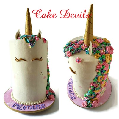 Tall unicorn face cake