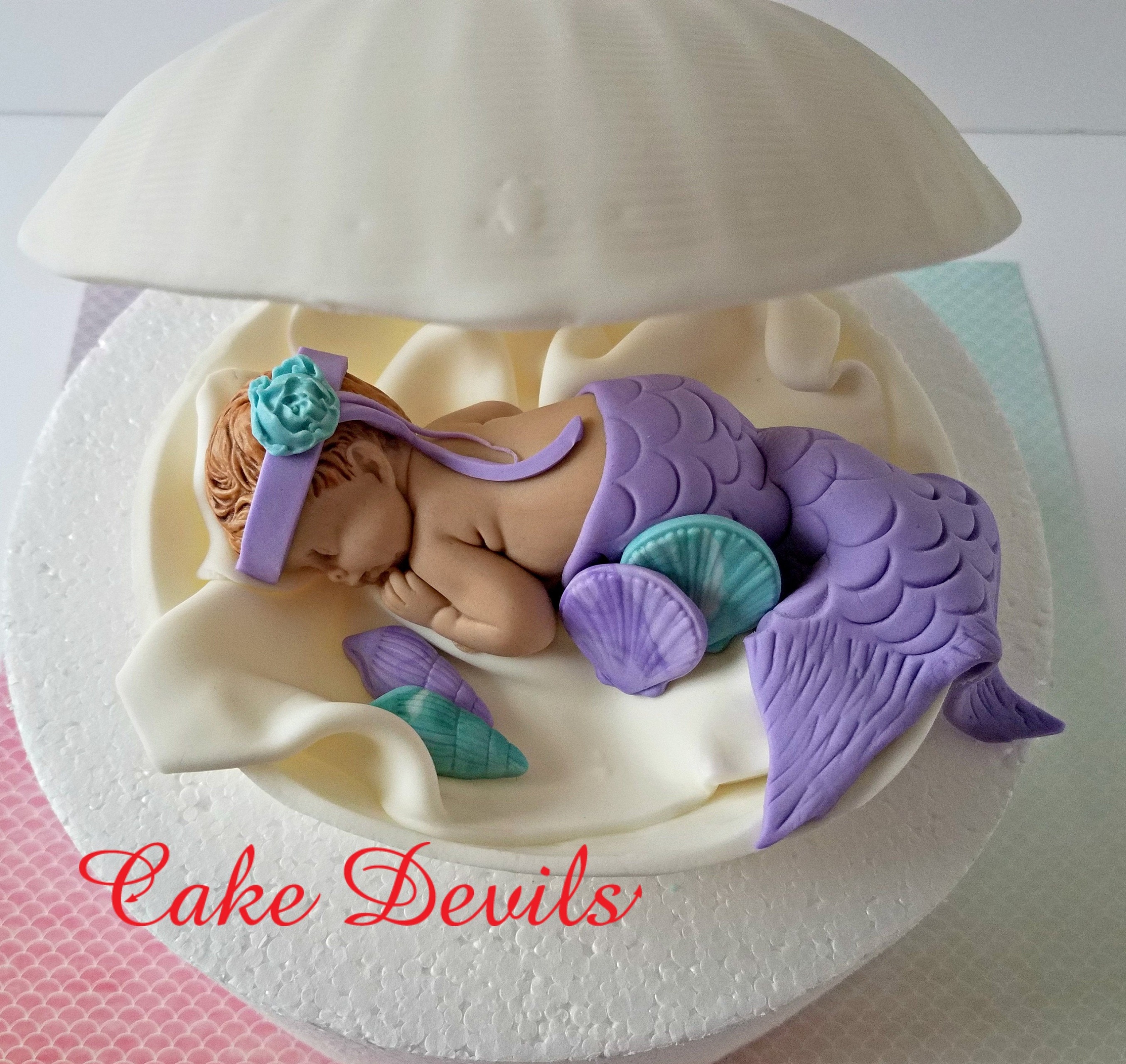 Baby mermaid cake  Decorated Cake by Tiffany DuMoulin  CakesDecor